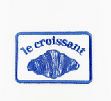 Le Croissant Patch Red Trucker Hat